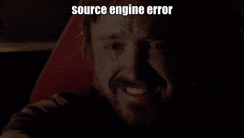 a man with a beard is smiling with the words source engine error above him