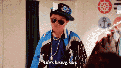 a boy wearing sunglasses and a hat says " life 's heavy son "