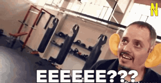 a man in a gym says eeeee?? in front of him