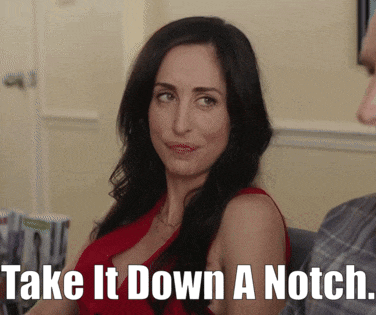 a woman says take it down a notch while looking at a man