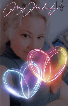 a woman in a blue shirt is surrounded by hearts and the words my melody
