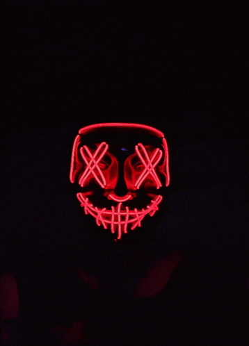 a red neon mask with crosses on it