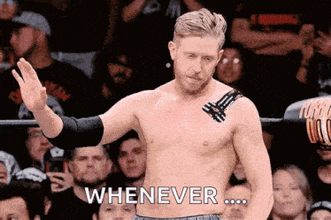 a shirtless wrestler says whenever in front of a crowd of people