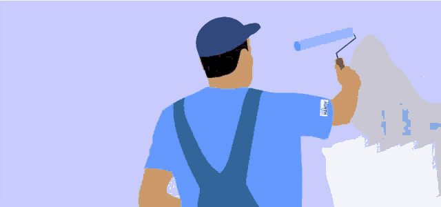 a man is painting a wall with a paint roller and a sticker on his shirt that says ' a '