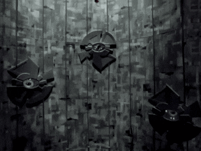 a black and white photo of a wall with a few pieces of metal hanging from it