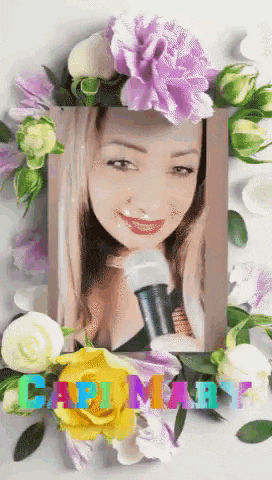 a picture of a woman holding a microphone surrounded by flowers