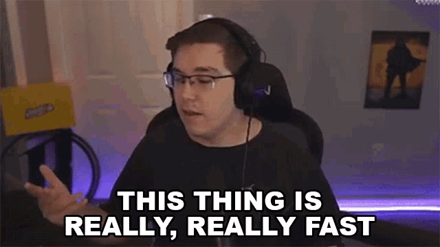a man wearing headphones and glasses says this thing is really really fast