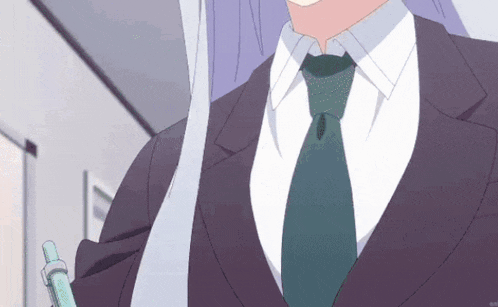 a man in a suit and tie is holding a pen in his hand