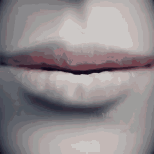 a close up of a woman 's lips with red lipstick and white teeth