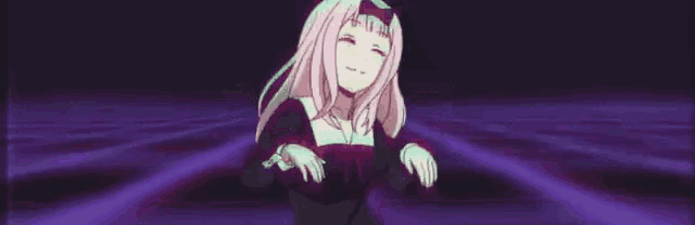 a girl with pink hair is dancing in front of a purple light .