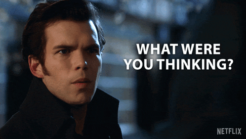 a man in a black coat with the words what were you thinking on the bottom