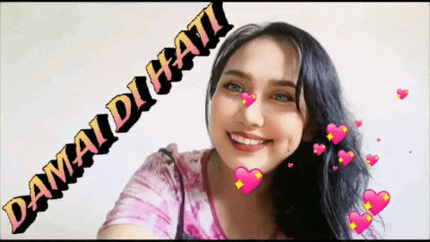 a woman with hearts around her and the words damai di hati