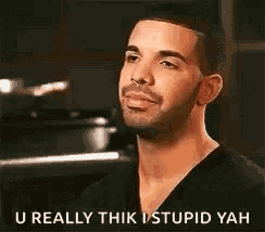 a man with a beard is making a funny face and says u really thik stupid yah