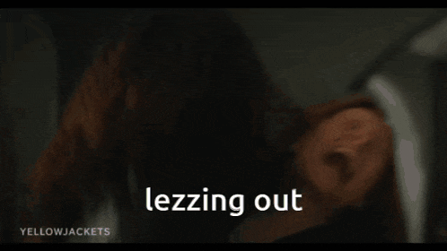 a close up of a person 's face with the words lezzing out in white