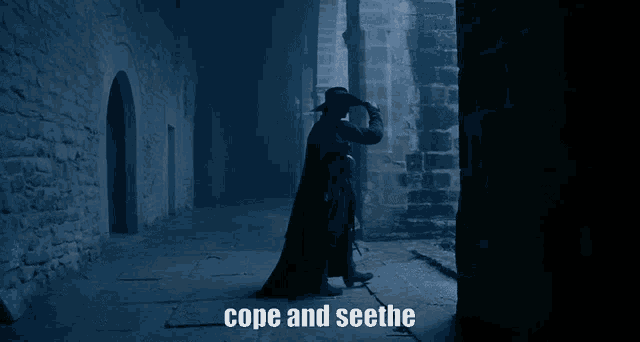 a man in a black cape is standing in a dark hallway with the words cope and seethe written on the bottom