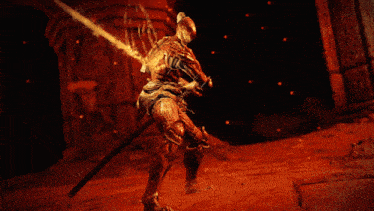 a person in a video game is holding a sword in front of a fireball