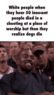 a man sitting in a crowd with a caption that says white people when they hear 50 innocent people died