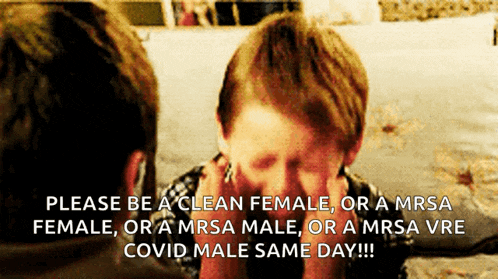a boy covering his face with his hands with the words please be a clean female or a mrsa female or a mrsa male