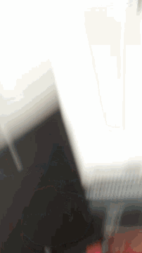 a blurry picture of a person 's face with a white background