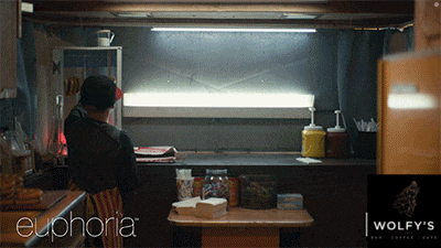 an ad for euphoria and wolfy 's bar coffee
