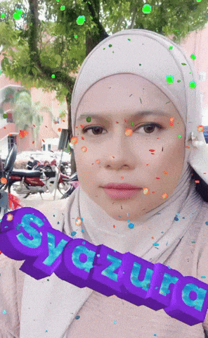 a woman wearing a hijab is holding a purple sign that says syazura