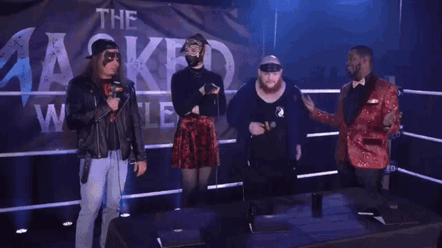 a group of people in a wrestling ring with the words i 'm mystified alright