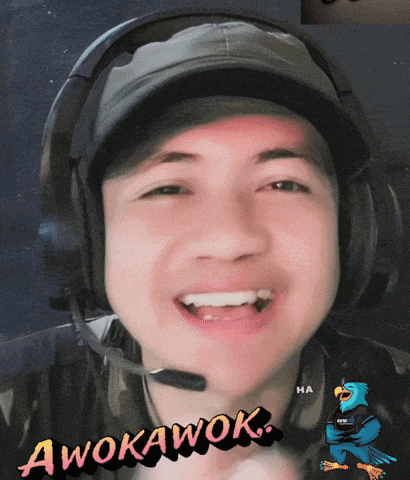 a man wearing headphones and a hat with the word awokawok on the bottom right