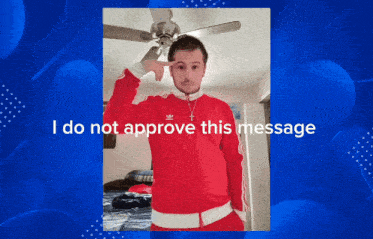 a man in a red adidas jacket is pointing at his head with the words " i do not approve this message " above him
