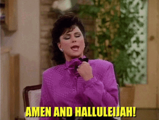a woman in a purple shirt is sitting in a chair and says amen and hallelujah