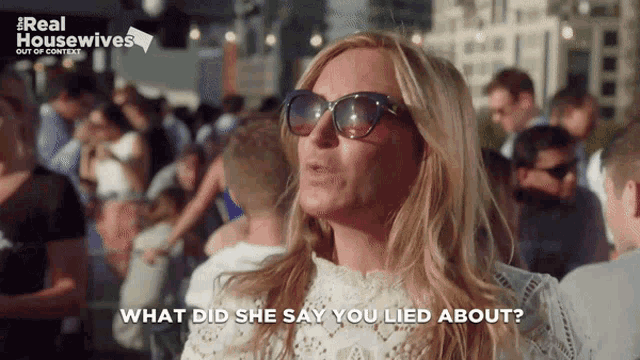 a woman wearing sunglasses says what did she say you lied about in front of a crowd