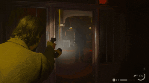 a man holding a gun in a video game with the number 912 in the lower right corner