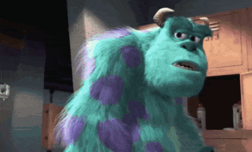 sulley from monsters inc is standing in front of a locker with the number 313 on it