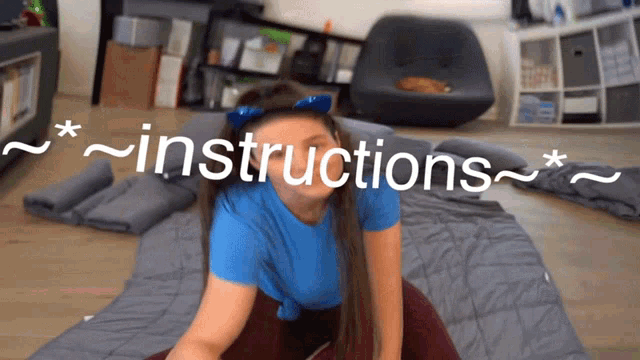 a woman in a blue shirt is laying on a blanket with instructions written on the bottom