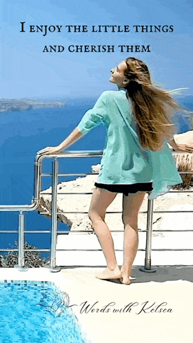 a woman leaning on a railing overlooking the ocean with the words " i enjoy the little things and cherish them " above her