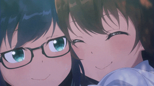 two anime girls wearing glasses are hugging each other and smiling