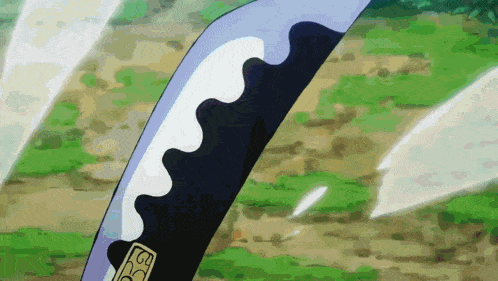 a close up of a sword with the letter s on the handle