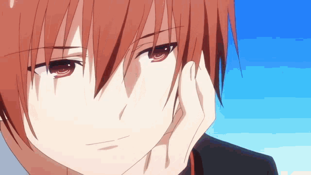 a close up of a person with red hair