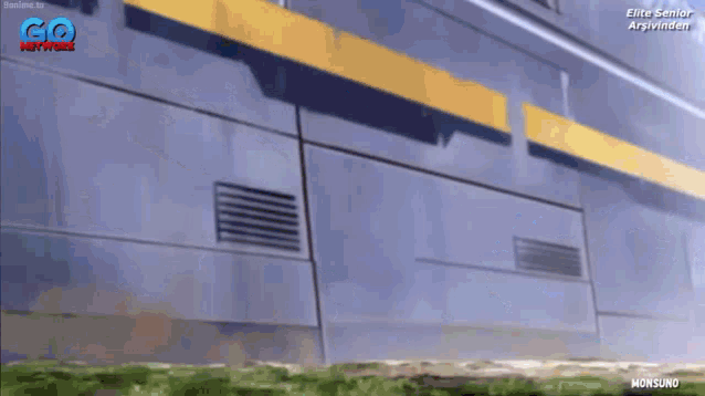 a cgi animation of a building with a go network logo on the bottom right