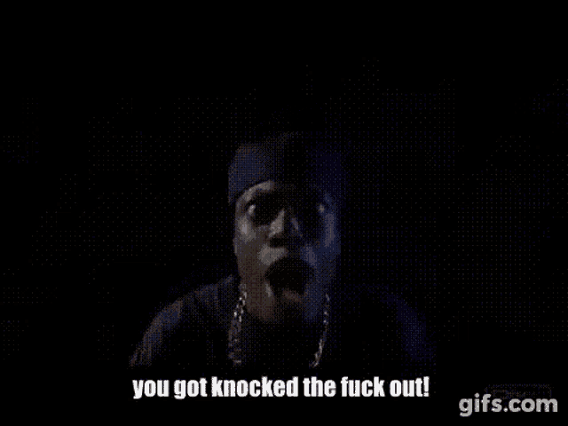 a man in a black hat is talking in the dark and says `` you got knocked the fuck out ! ''