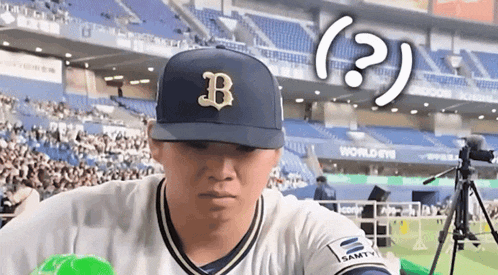a baseball player is wearing a blue hat with the letter b on it .