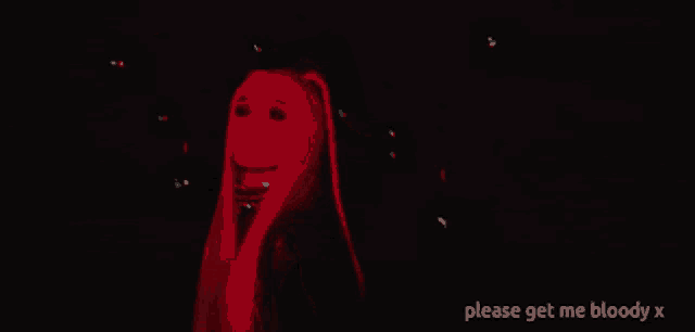 a woman with long blonde hair is surrounded by red lights and the words please get me bloody x are below her