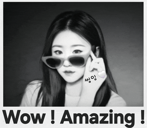 a black and white photo of a woman with sunglasses and the words wow amazing
