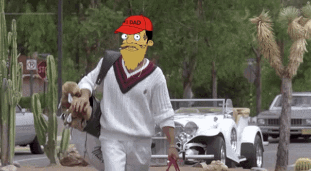 a man with a beard wearing a red hat that says " my dad "