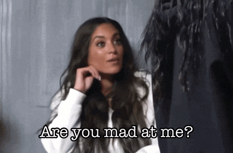 a woman with long hair is asking if she is mad at herself