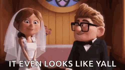 a bride and groom are standing next to each other in a church and the bride is wearing a veil .