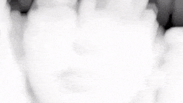 a close up of a person 's face with their eyes closed in a black and white drawing .