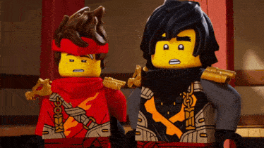 two lego characters are standing next to each other and one has a scarf around his neck