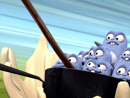 a bunch of cartoon characters are sitting in a pot