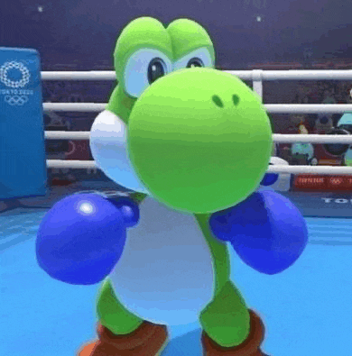 a green dinosaur is wearing blue boxing gloves and standing in a boxing ring .