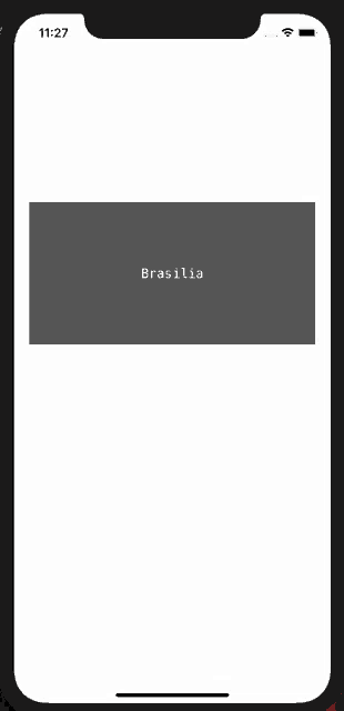 a cell phone screen shows the word brasilia on the bottom